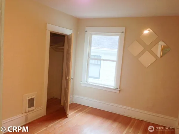 an empty room with windows