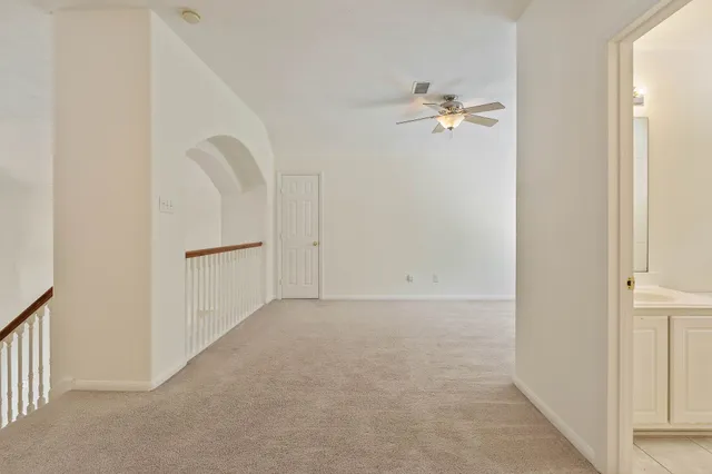 a view of empty room with closet