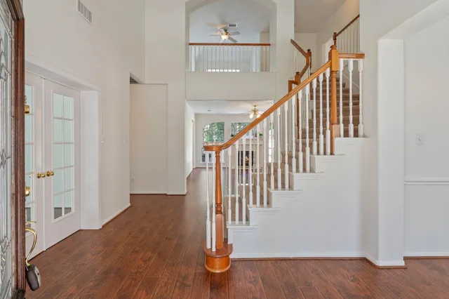 a view of entryway with wooden floor