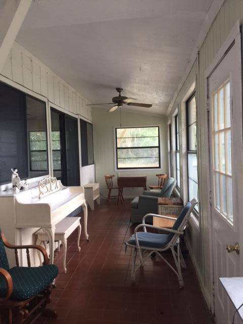 692 Piney Point Road Freeport, FL 32439 - Photo 12 of 17 a living room with furniture and a large window
