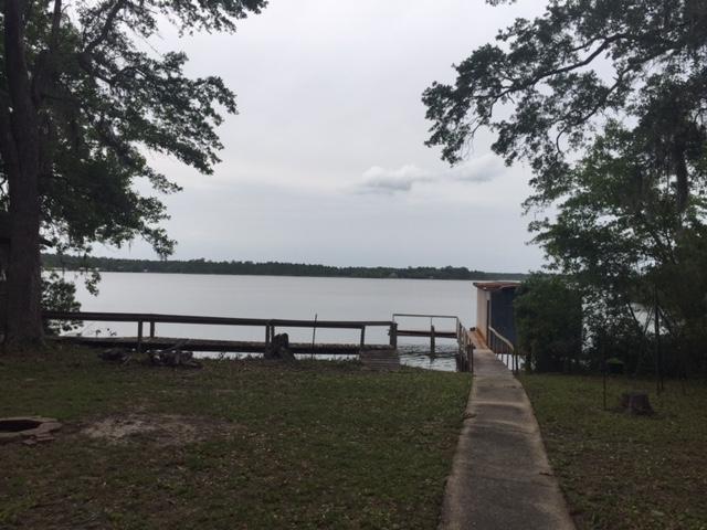 692 Piney Point Road Freeport, FL 32439 - Photo 5 of 17 a view of a lake