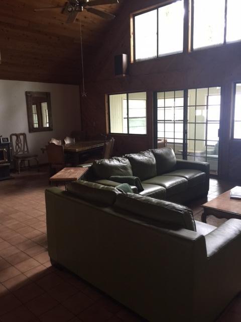 692 Piney Point Road Freeport, FL 32439 - Photo 10 of 17 a living room with furniture and a window