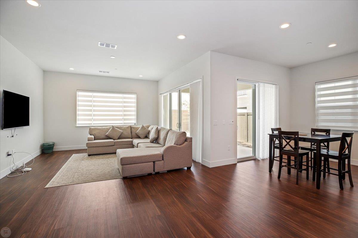 4205 Maddy Avenue Tracy, CA 95377 - Photo 12 of 45 a living room with furniture and a flat screen tv