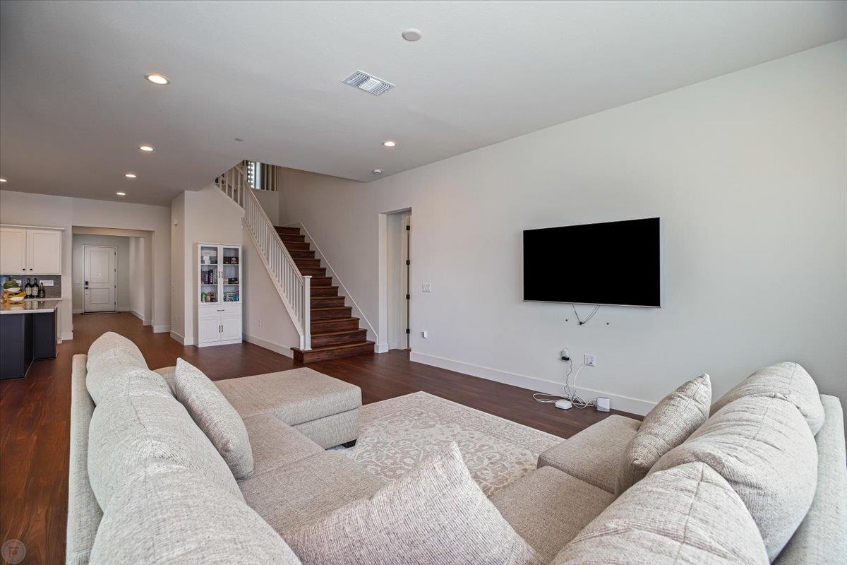 4205 Maddy Avenue Tracy, CA 95377 - Photo 15 of 45 a living room with furniture and a flat screen tv