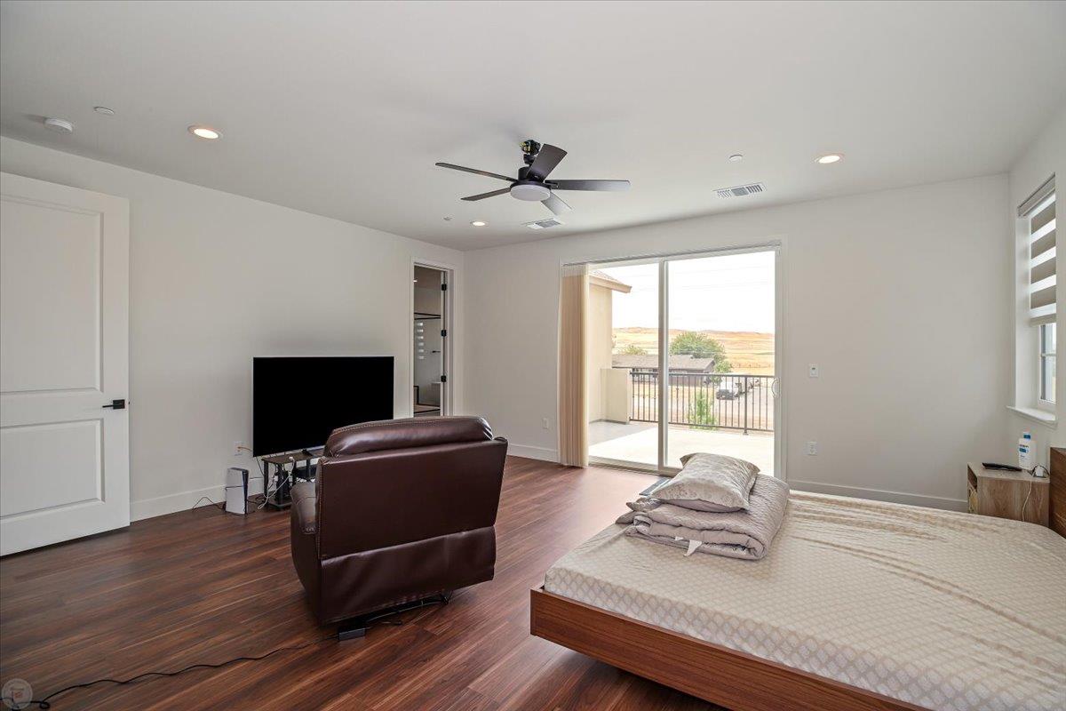4205 Maddy Avenue Tracy, CA 95377 - Photo 25 of 45 a living room with furniture and a flat screen tv