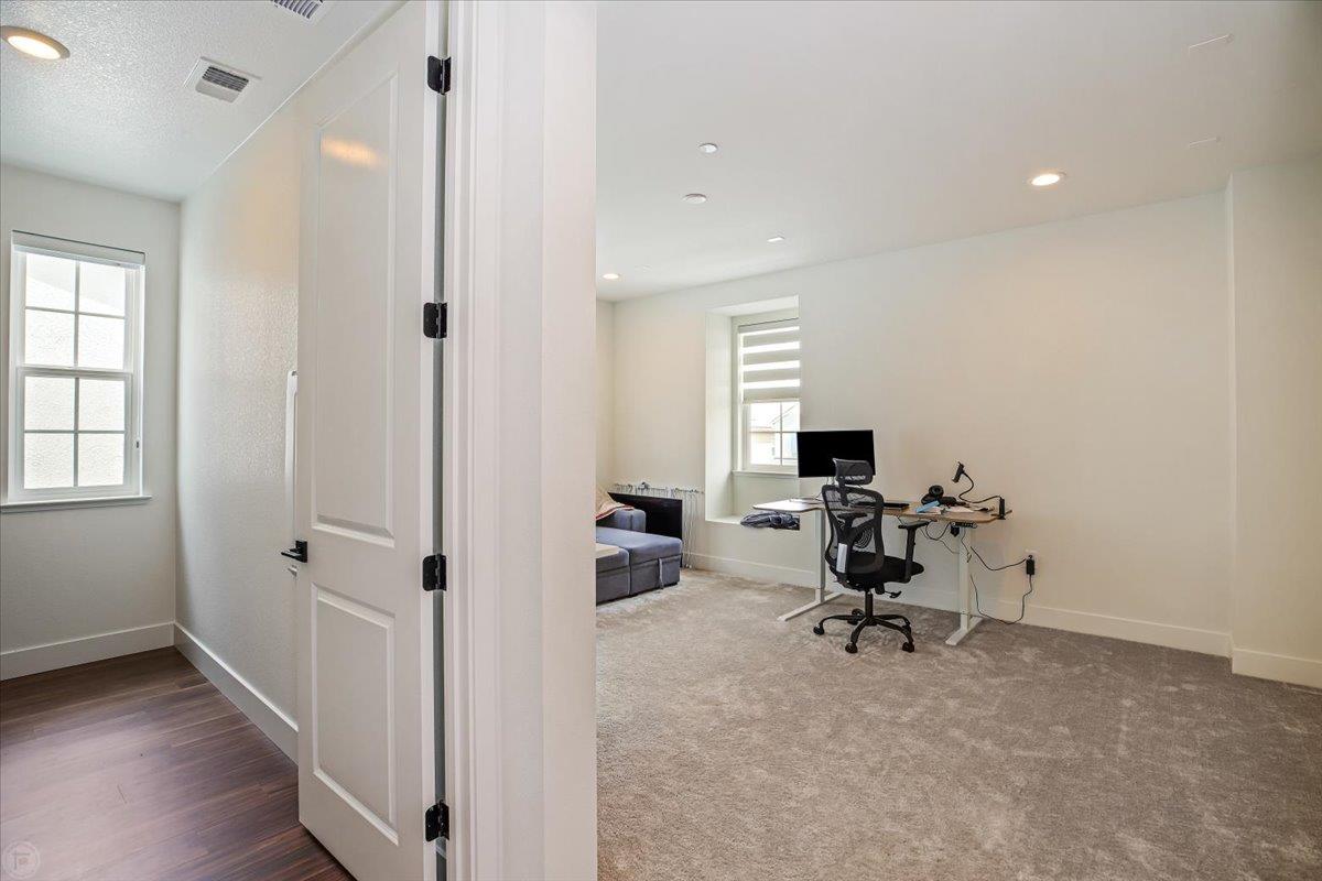 4205 Maddy Avenue Tracy, CA 95377 - Photo 29 of 45 a view of a workspace with furniture and a window
