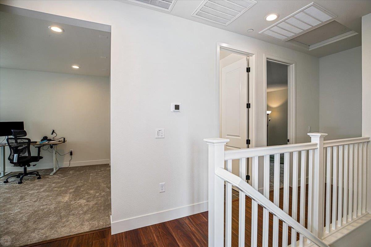 4205 Maddy Avenue Tracy, CA 95377 - Photo 32 of 45 a view of a hallway with workspace