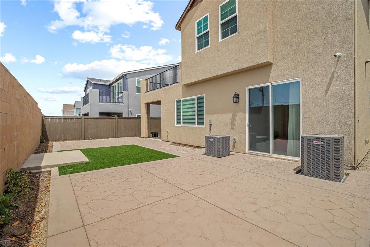 4205 Maddy Avenue Tracy, CA 95377 - Photo 38 of 45 a view of backyard of house and car parked