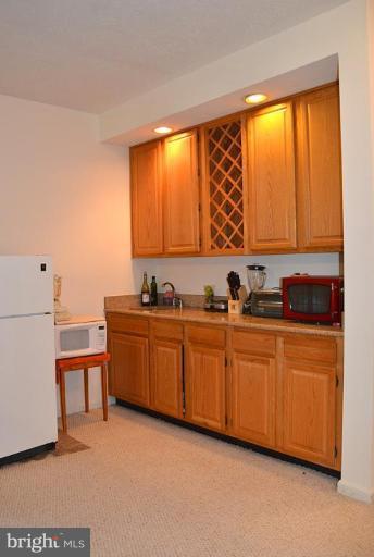 1244 Woodbrook Court Reston, VA 20194 - Photo 29 of 30 Full Wet Bar with Granite Counters in LL