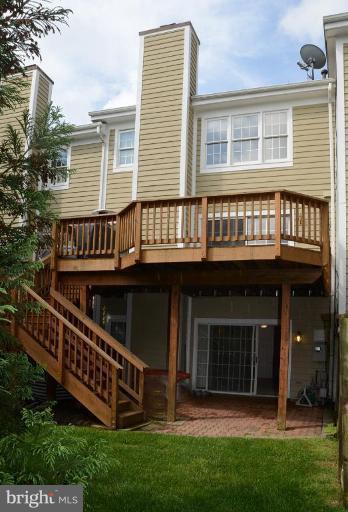 1244 Woodbrook Court Reston, VA 20194 - Photo 4 of 30 Full deck with stairs down to stone patio