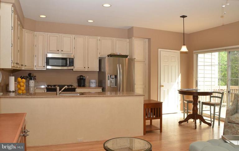 1244 Woodbrook Court Reston, VA 20194 - Photo 8 of 30 Renovated Kitchen with breakfast bar