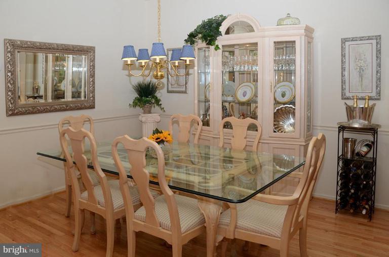 1244 Woodbrook Court Reston, VA 20194 - Photo 10 of 30 Lovely DR with chair rail and columns