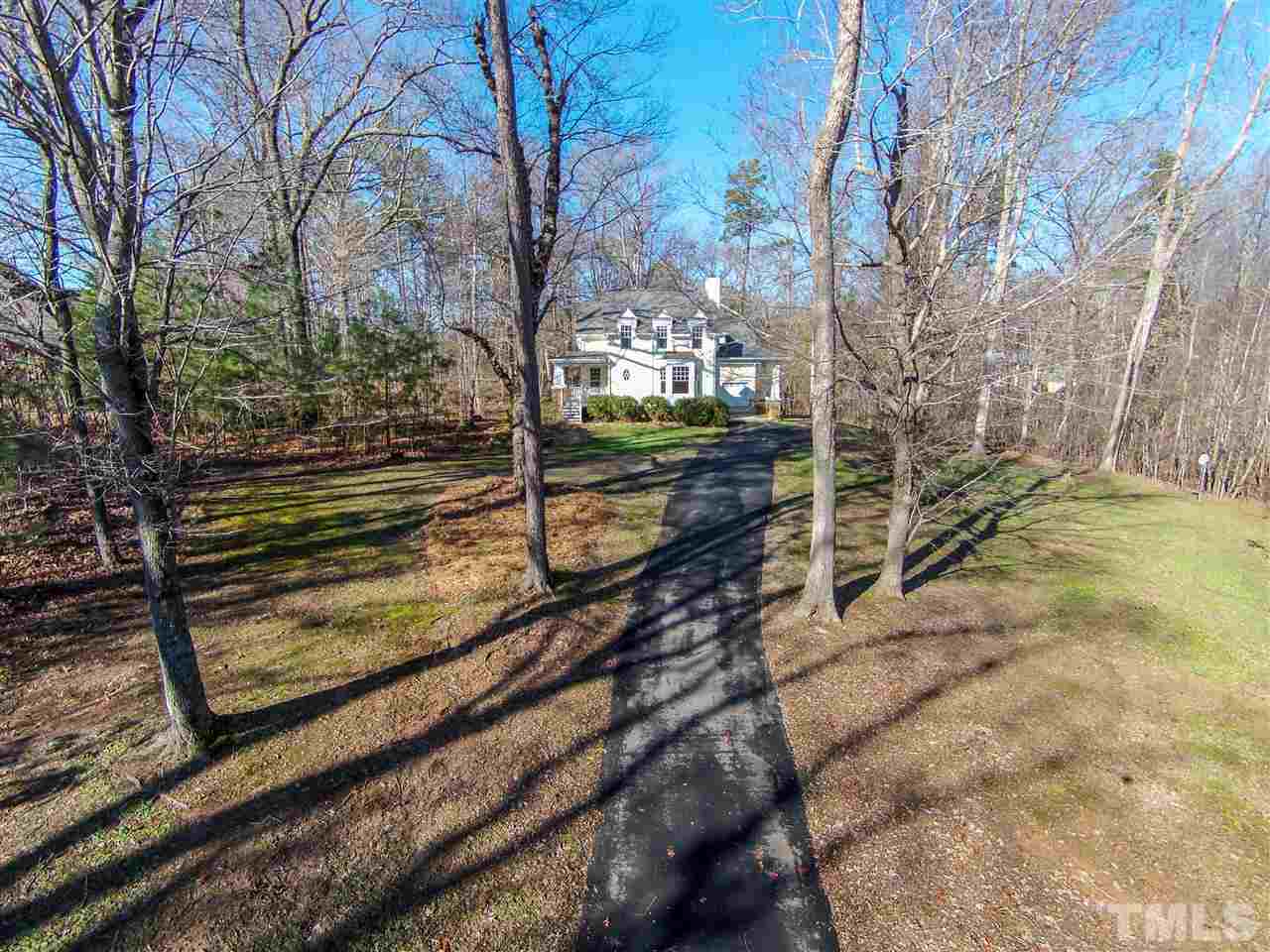 13423 Melvin Arnold Road Raleigh, NC 27613 - Photo 3 of 25 Custom 4 bedroom home on large scenic 2.14-acre lot.