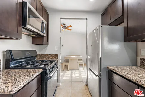 a view of workspace with a window and sitting area