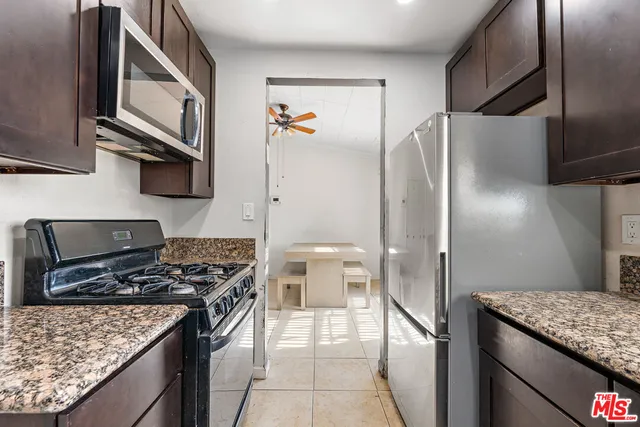 a view of workspace with a window and sitting area