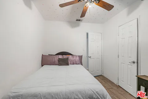a view of a house with a yard patio and swimming pool