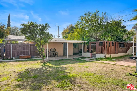 a house with trees in front of it