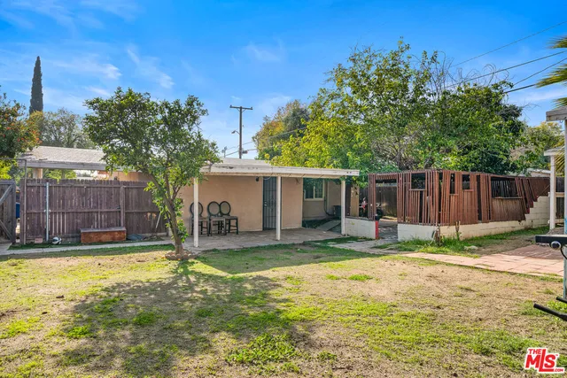 a house with trees in front of it