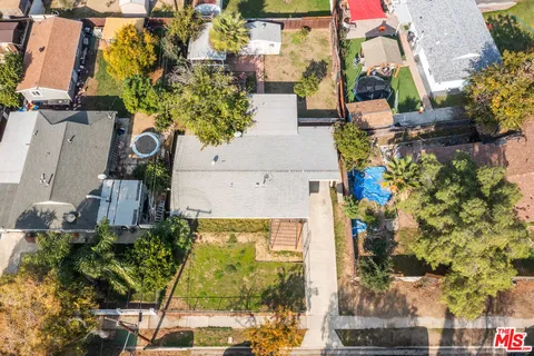 an aerial view of a city with lots of residential buildings