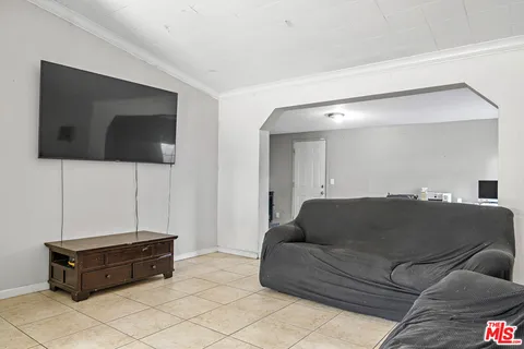 a kitchen with a stove and a refrigerator