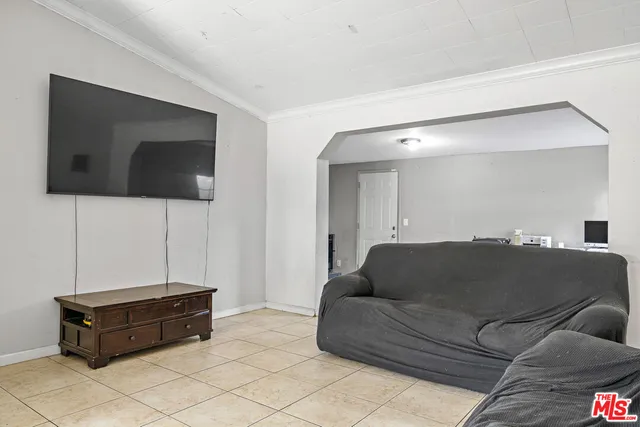 a kitchen with a stove and a refrigerator