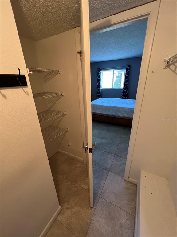 7110 Cognac Drive, Unit 2 New Port Richey, FL 34653 - Photo 15 of 24 a bathroom with a sink and a mirror