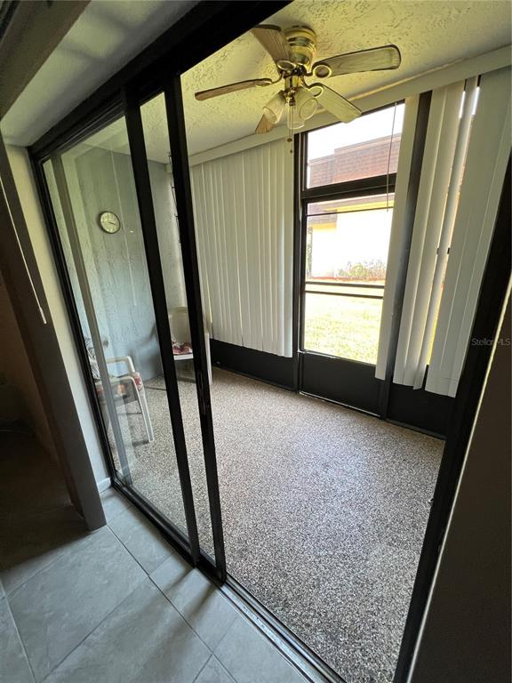 7110 Cognac Drive, Unit 2 New Port Richey, FL 34653 - Photo 18 of 24 a view of an entryway door