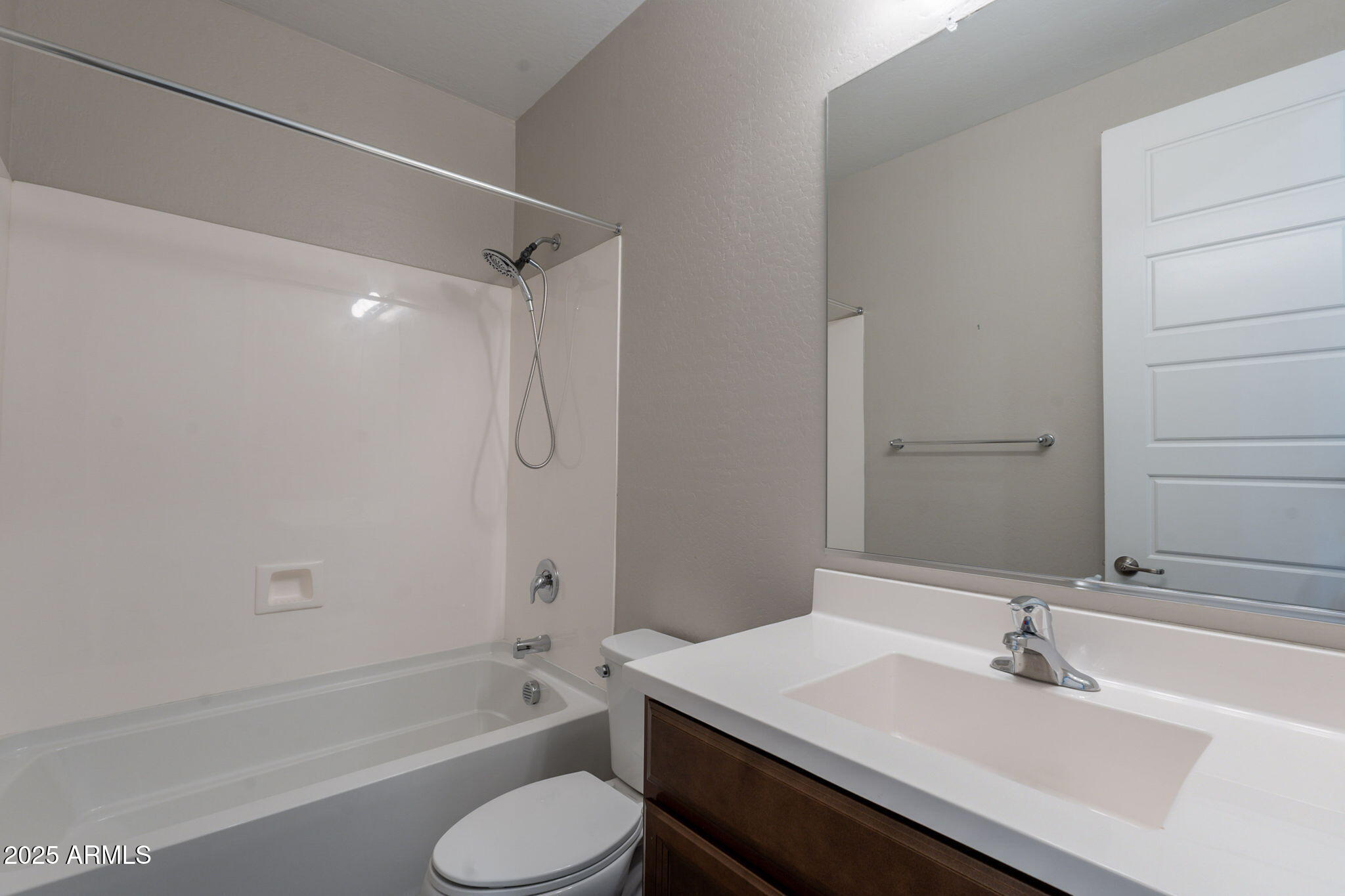 98 North Bay Drive Gilbert, AZ 85233 - Photo 15 of 37 a bathroom with a sink toilet and shower
