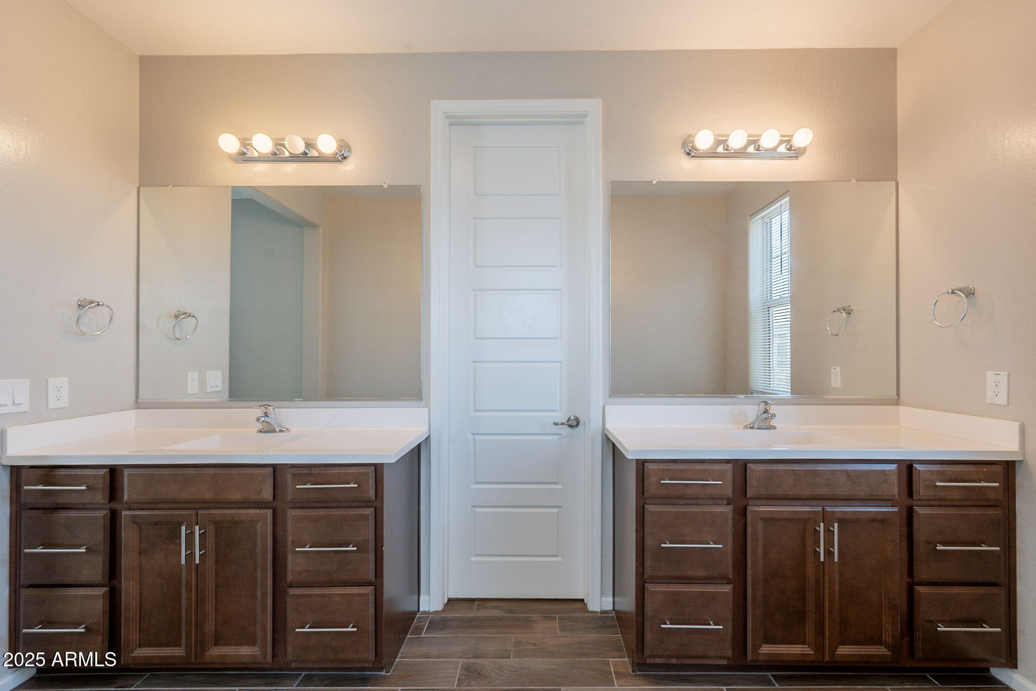 98 North Bay Drive Gilbert, AZ 85233 - Photo 24 of 37 a spacious bathroom with a granite countertop sink and a mirror