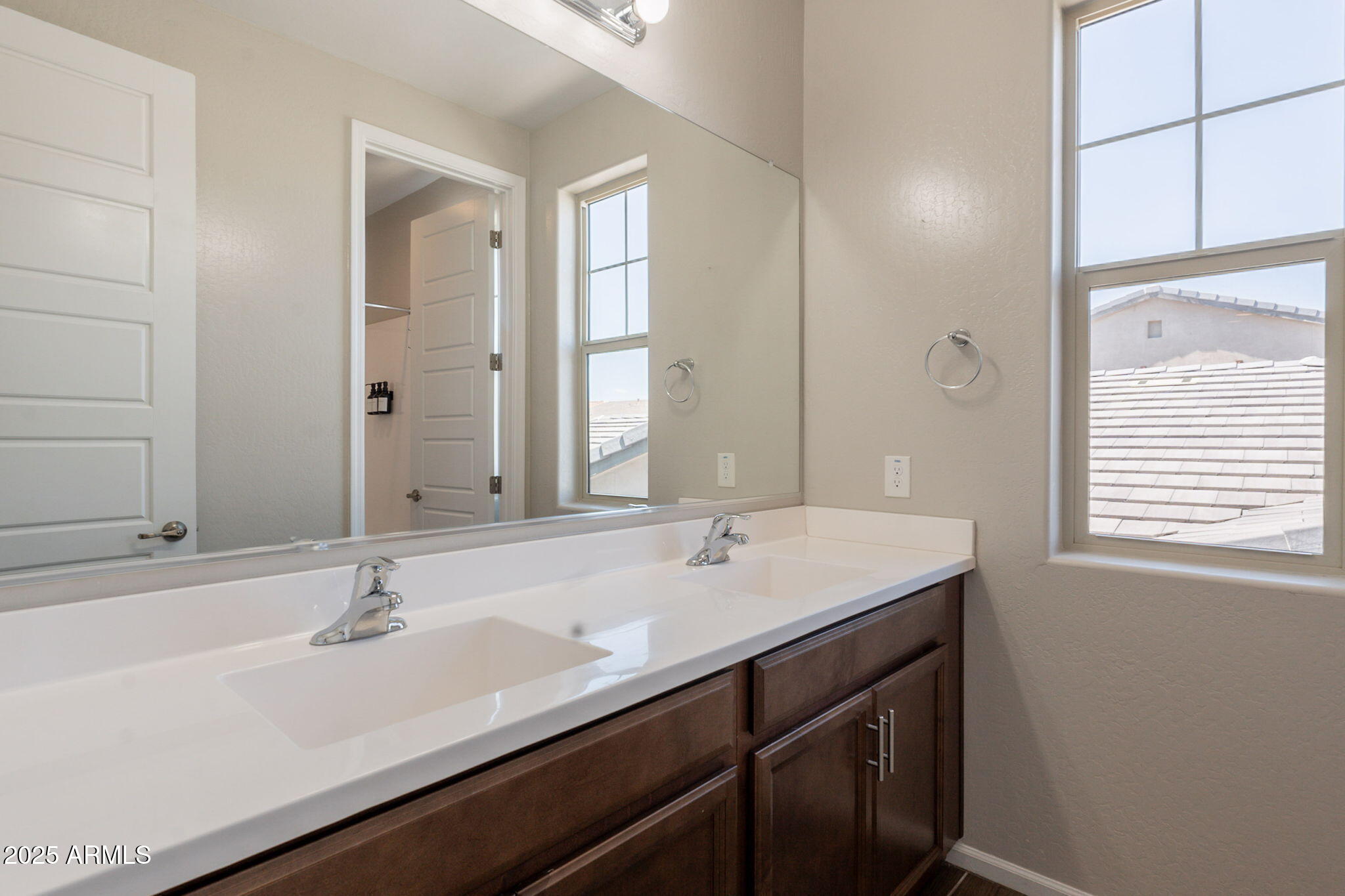 98 North Bay Drive Gilbert, AZ 85233 - Photo 30 of 37 a bathroom with a sink and a mirror