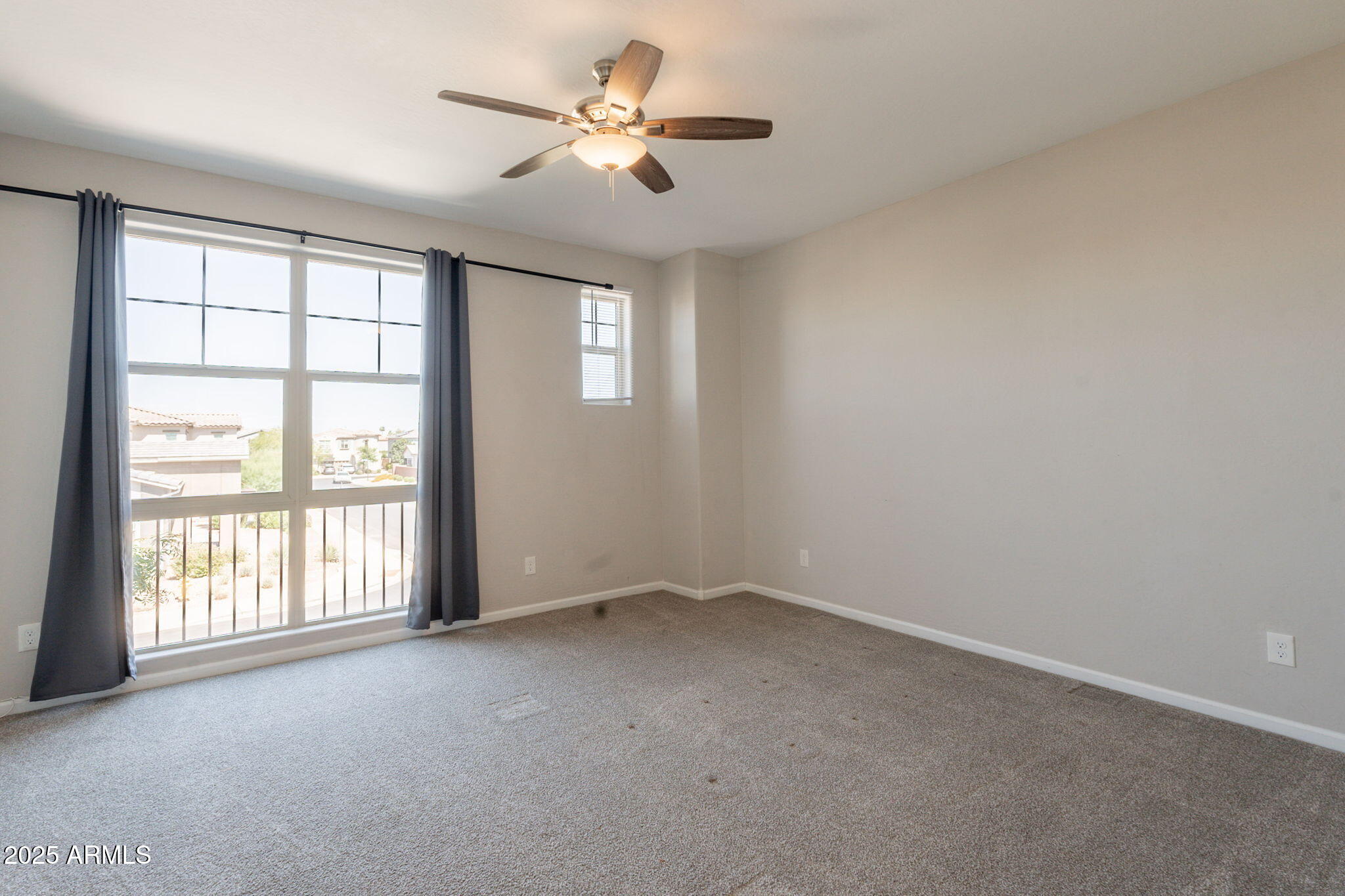 98 North Bay Drive Gilbert, AZ 85233 - Photo 31 of 37 wooden floor in an empty room with a window