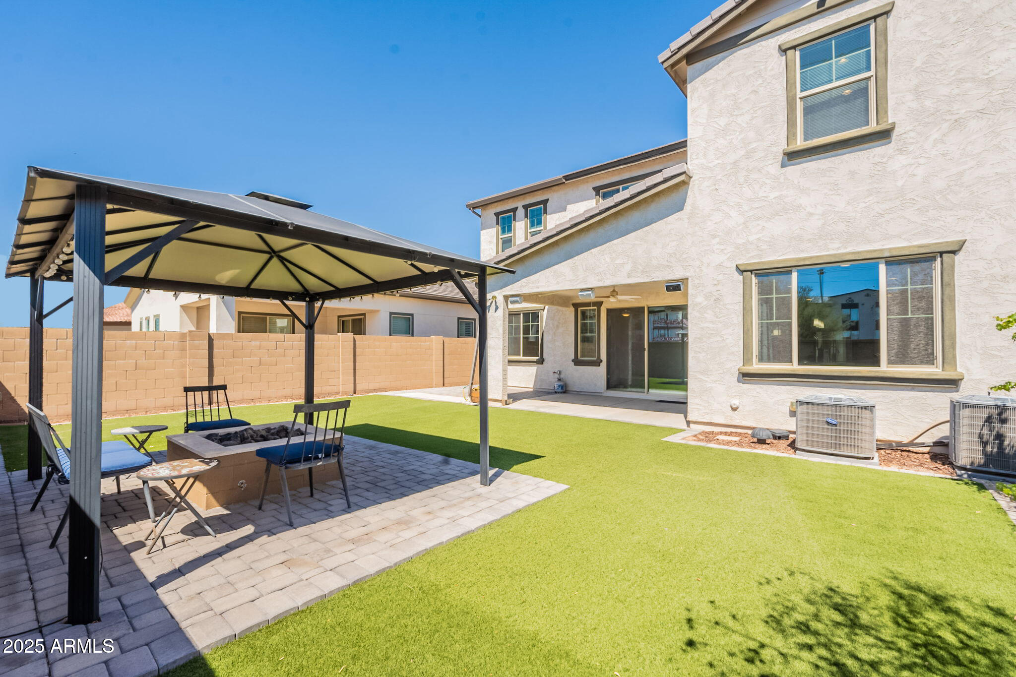 98 North Bay Drive Gilbert, AZ 85233 - Photo 35 of 37 a view of a house with swimming pool and sitting area
