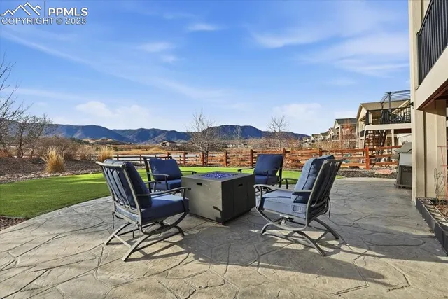 a view of a terrace with furniture