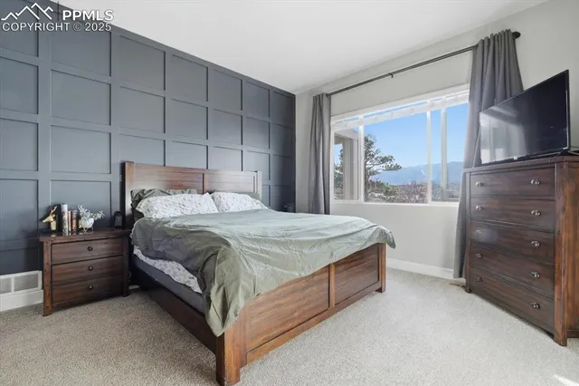 a bedroom with a bed and furniture