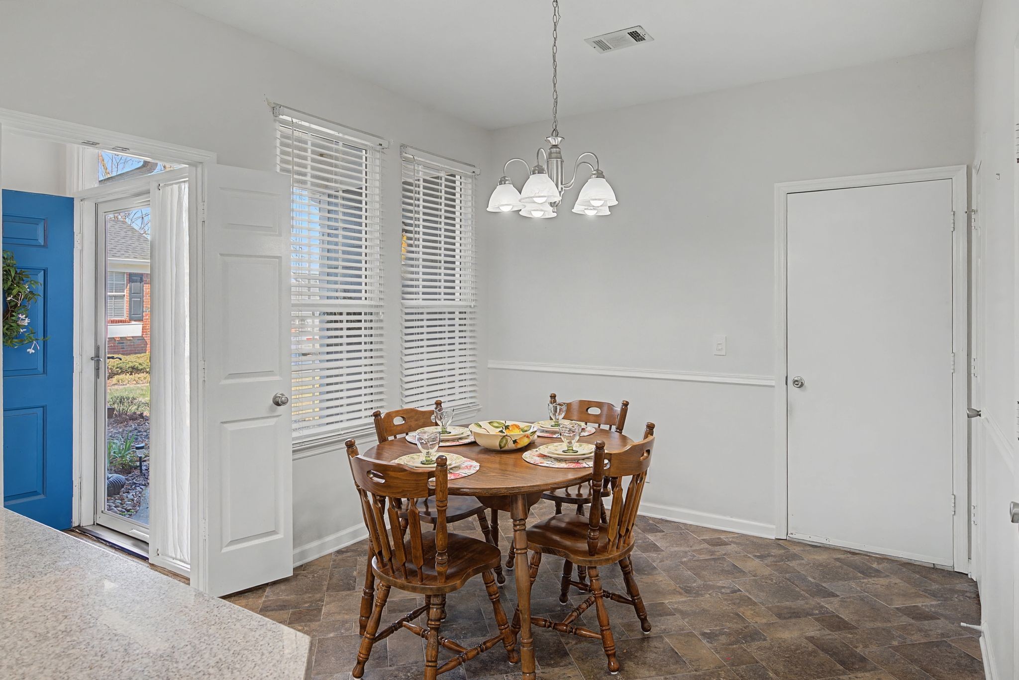 231 Green Harbor Road, Unit 8 Old Hickory, TN 37138 - Photo 12 of 36 a view of a dining room with furniture and chandelier