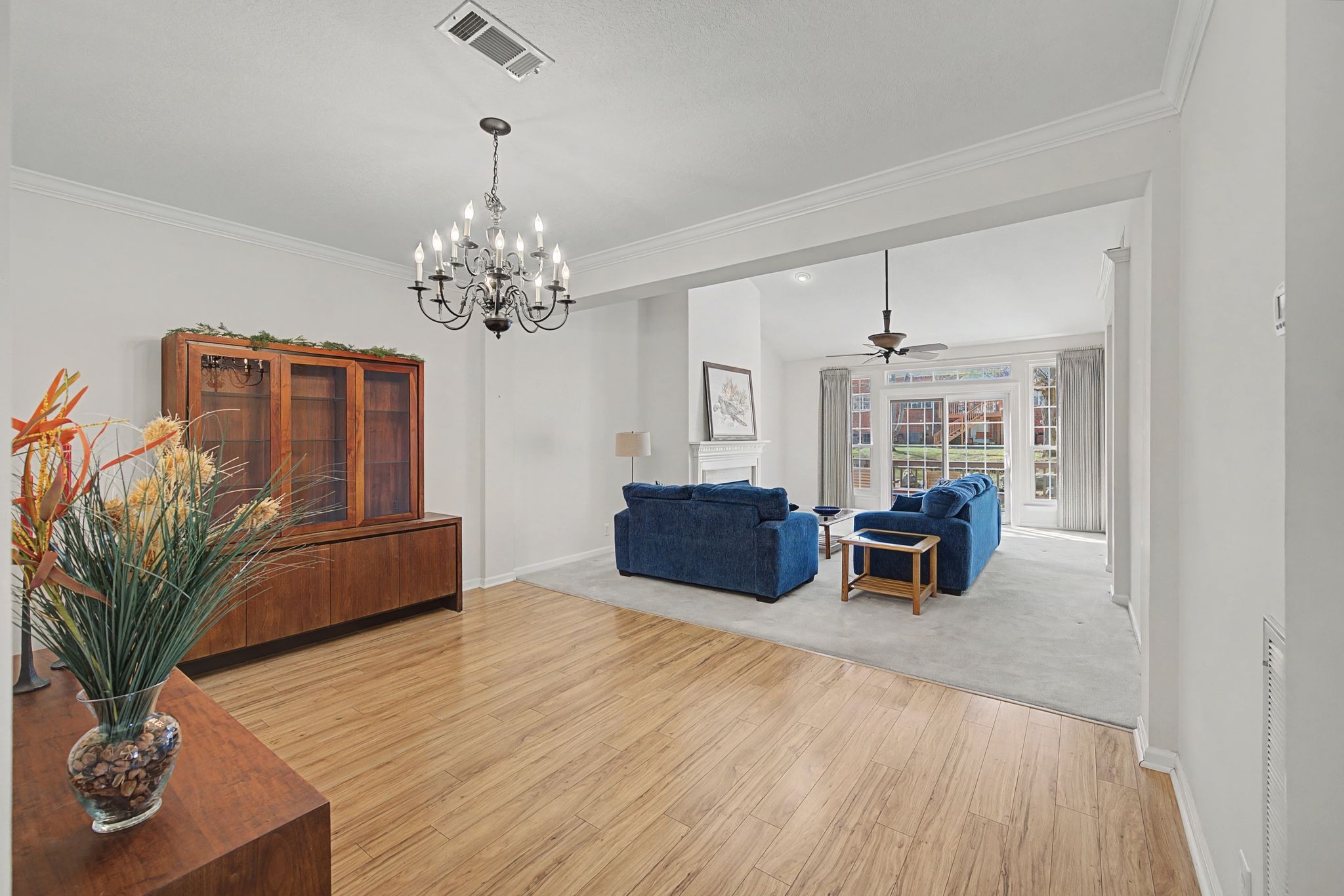 231 Green Harbor Road, Unit 8 Old Hickory, TN 37138 - Photo 15 of 36 a living room with furniture and a chandelier