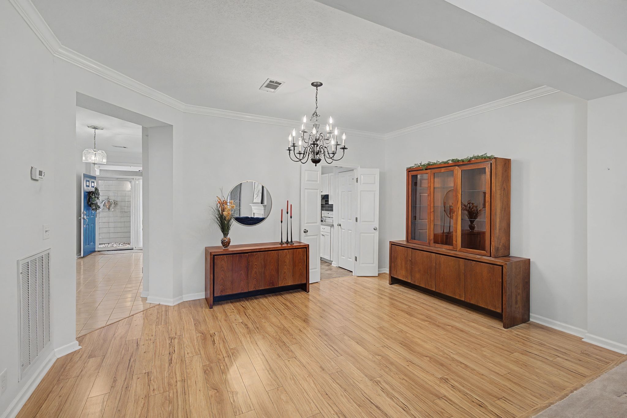 231 Green Harbor Road, Unit 8 Old Hickory, TN 37138 - Photo 16 of 36 a living room with furniture and a chandelier