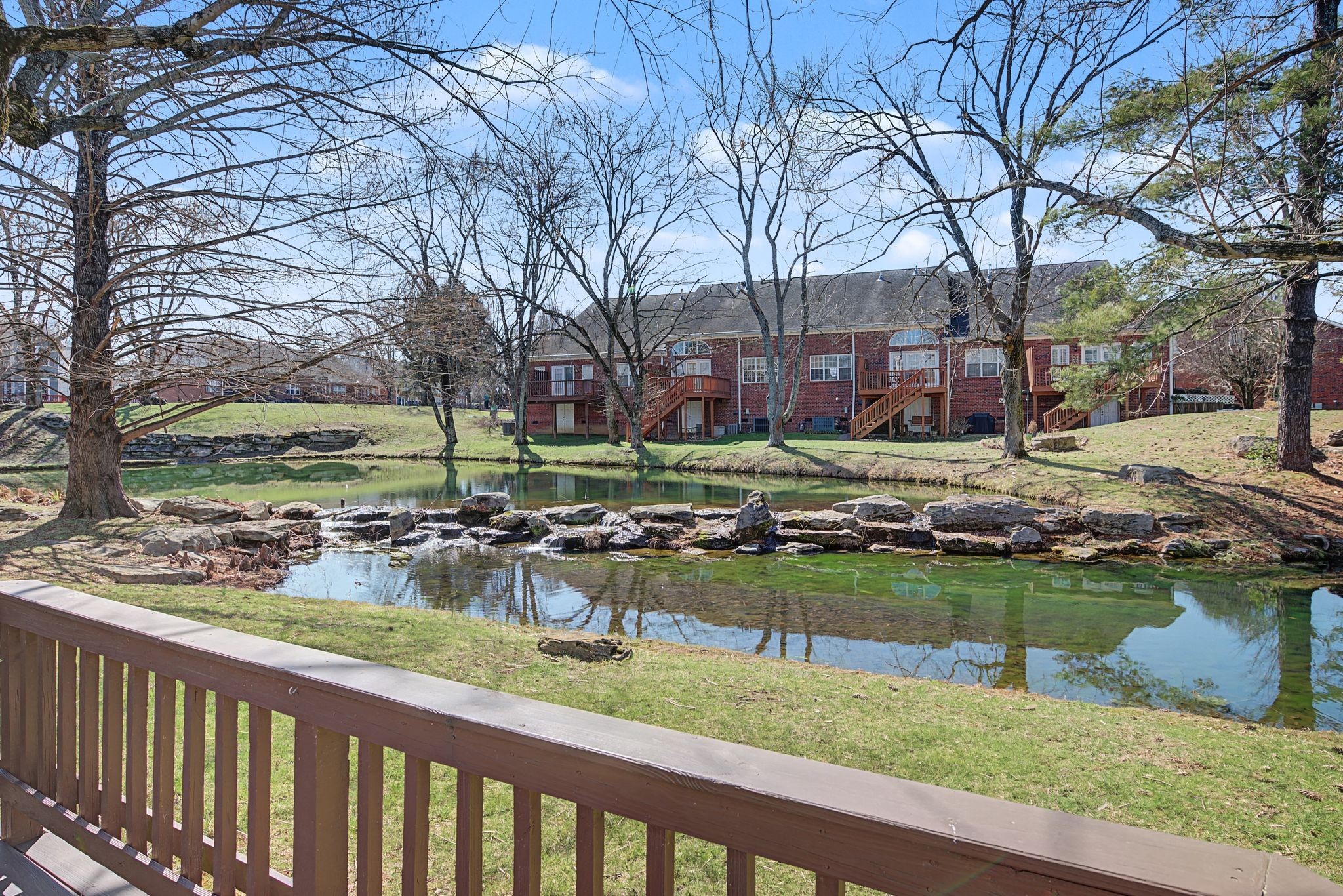 231 Green Harbor Road, Unit 8 Old Hickory, TN 37138 - Photo 2 of 36 a view of a house with a yard