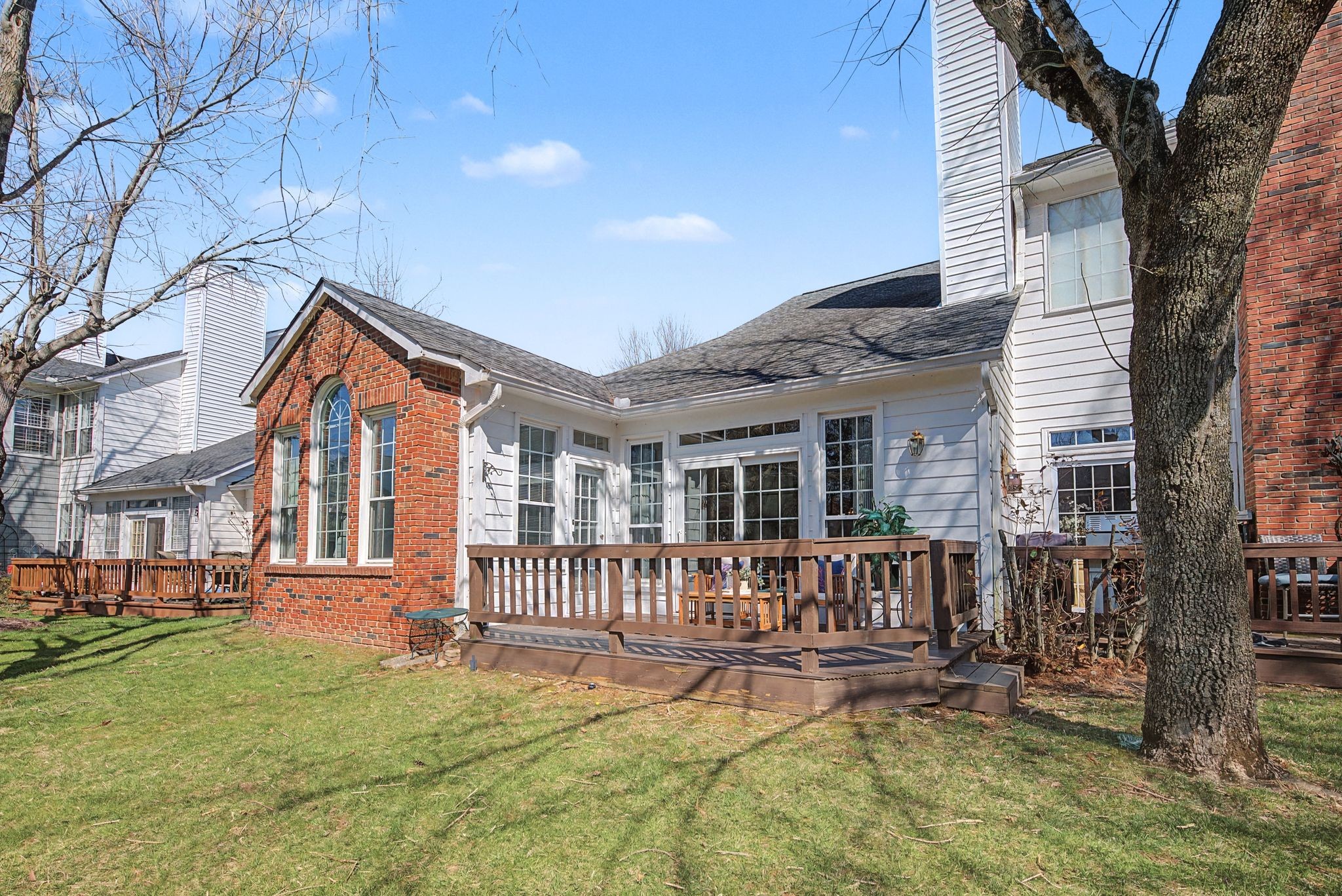 231 Green Harbor Road, Unit 8 Old Hickory, TN 37138 - Photo 25 of 36 a view of a house with backyard porch and sitting area