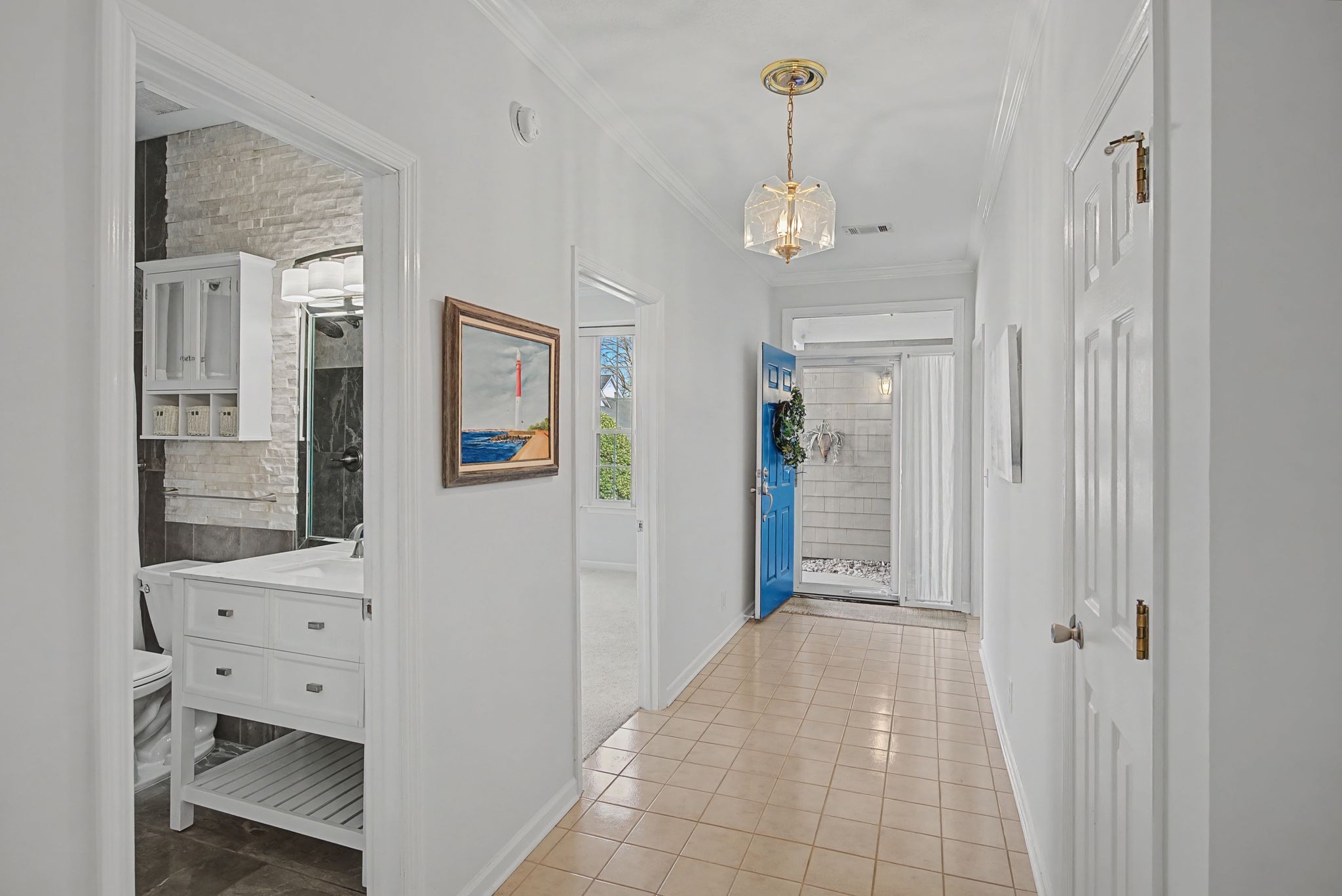 231 Green Harbor Road, Unit 8 Old Hickory, TN 37138 - Photo 5 of 36 a view of a hallway with wooden floor and a living room