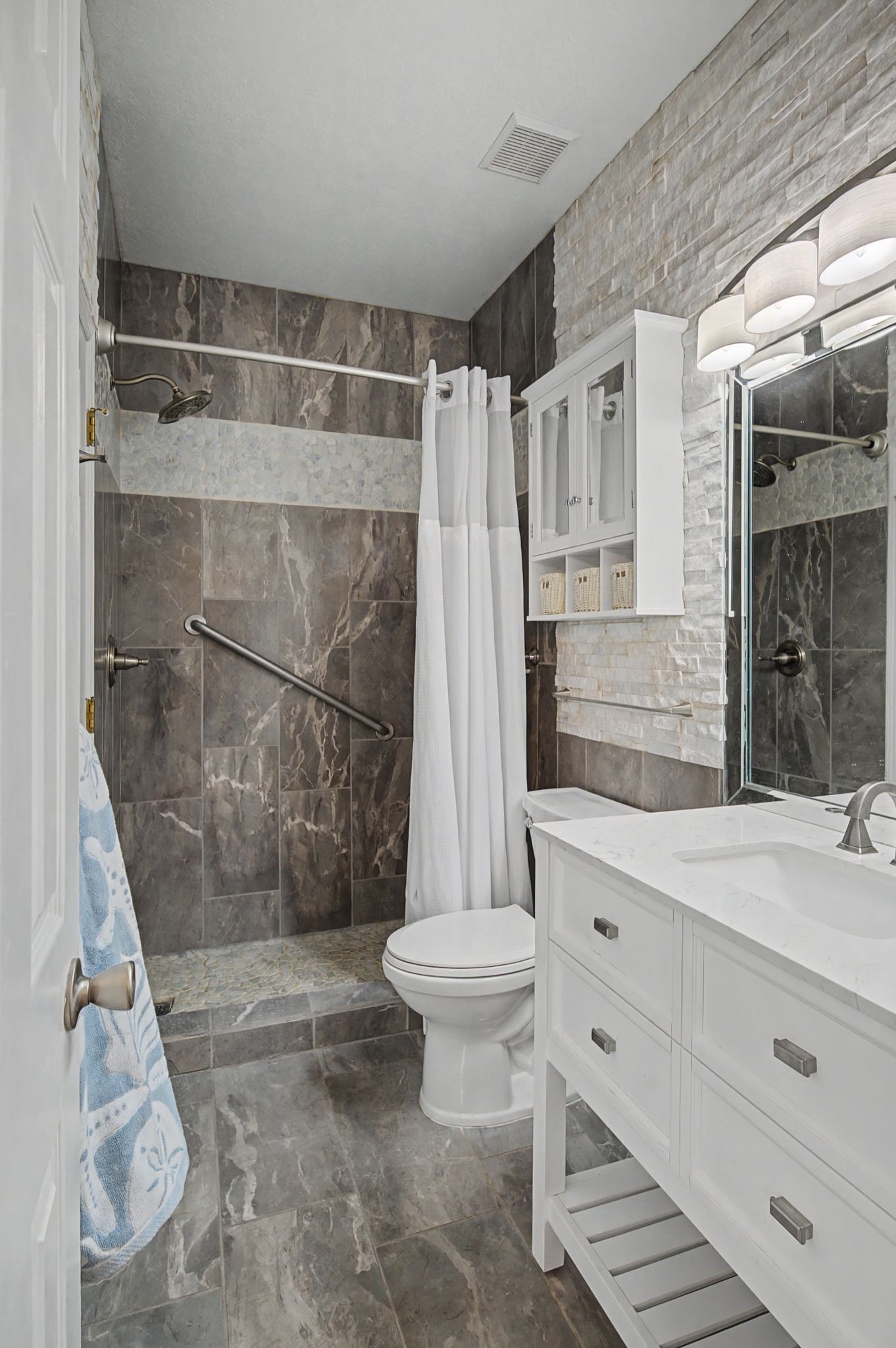 231 Green Harbor Road, Unit 8 Old Hickory, TN 37138 - Photo 8 of 36 a bathroom with a shower toilet and sink