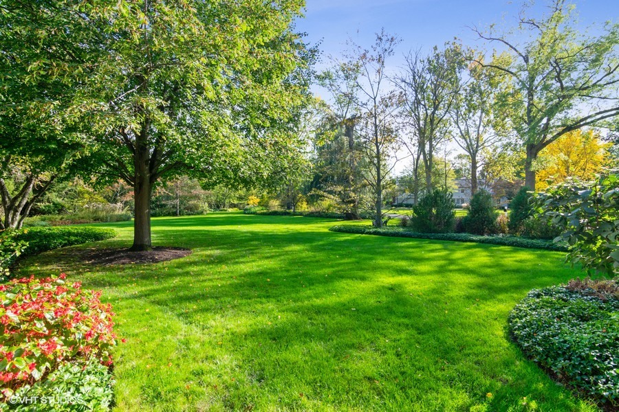 285 Old Farm Road Northfield, IL 60093 - Photo 2 of 21 a view of grassy field with benches