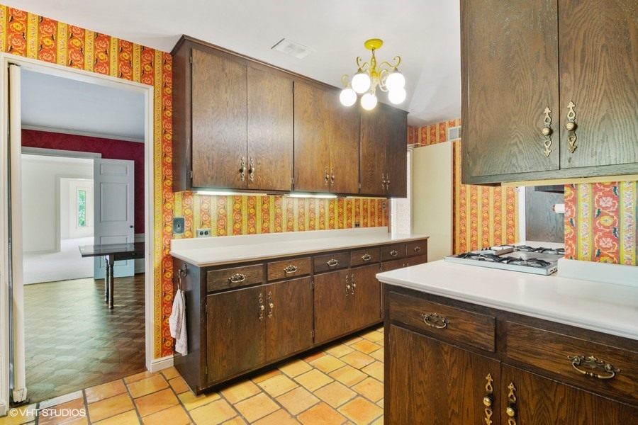 285 Old Farm Road Northfield, IL 60093 - Photo 13 of 21 a kitchen with a sink cabinets and window