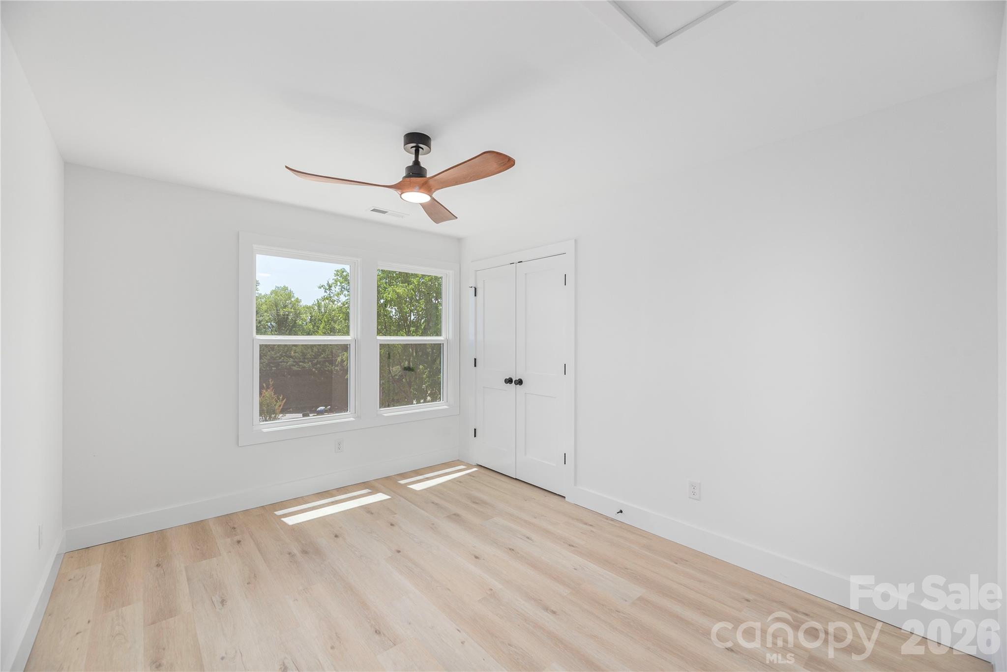 32 Oak Hill Road Candler, NC 28715 - Photo 19 of 29 an empty room with a window