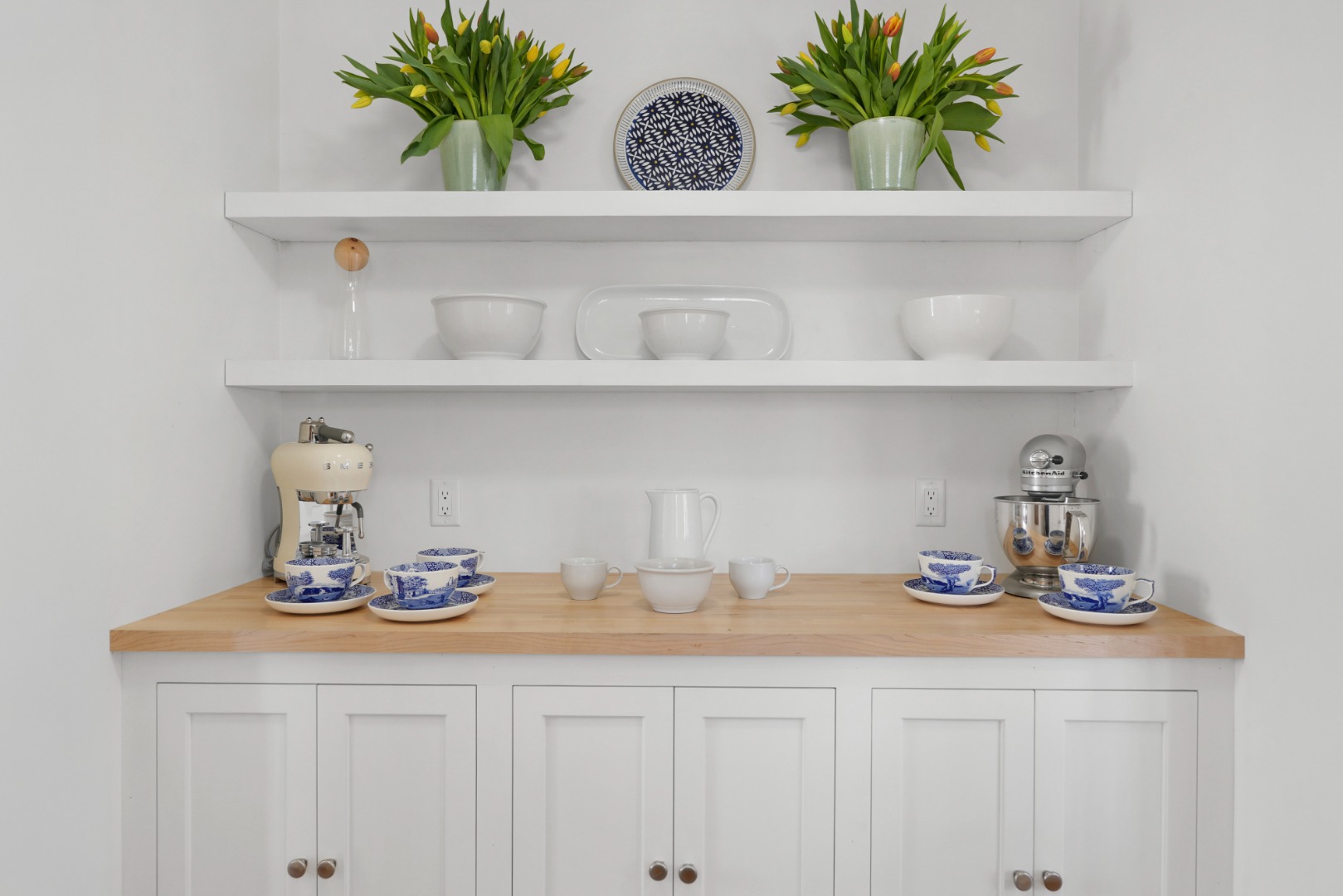 53 Stoney Hill Road West Tisbury, MA 02568 - Photo 19 of 51 a kitchen with a potted plant on the counter and a wooden floor