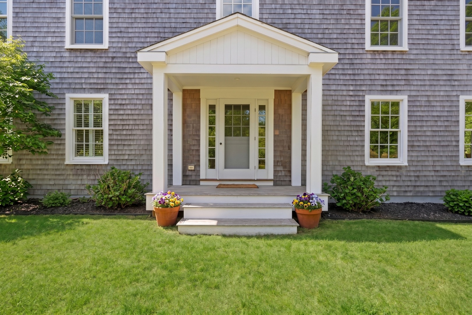 53 Stoney Hill Road West Tisbury, MA 02568 - Photo 2 of 51 a front view of a house with a yard