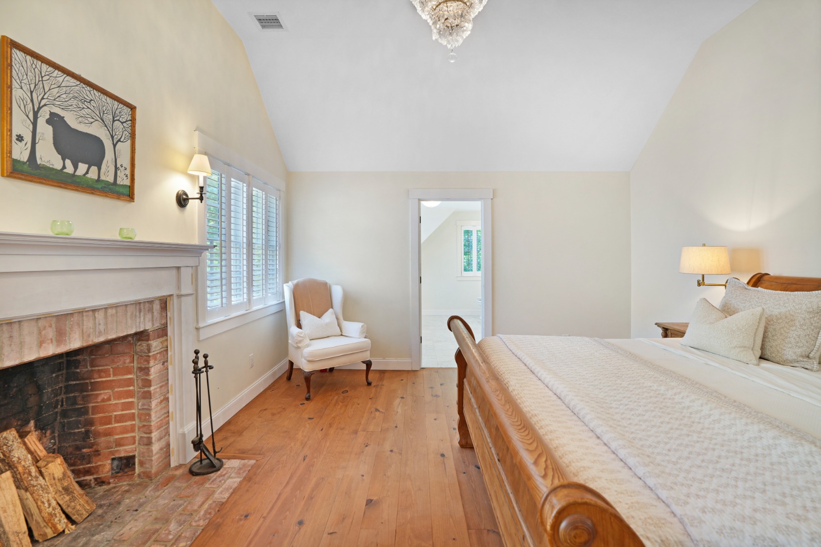 53 Stoney Hill Road West Tisbury, MA 02568 - Photo 26 of 51 a bedroom with a bed and wooden floor