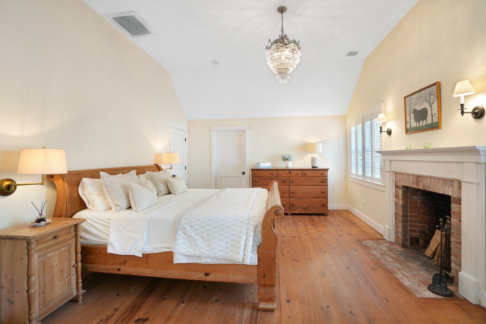53 Stoney Hill Road West Tisbury, MA 02568 - Photo 27 of 51 a bedroom with a bed and a fireplace