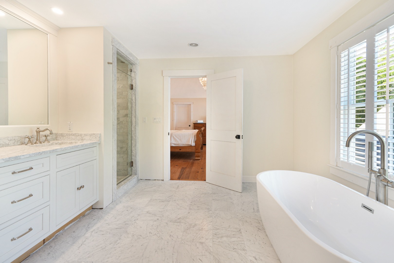 53 Stoney Hill Road West Tisbury, MA 02568 - Photo 28 of 51 a spacious bathroom with a tub sink and mirror