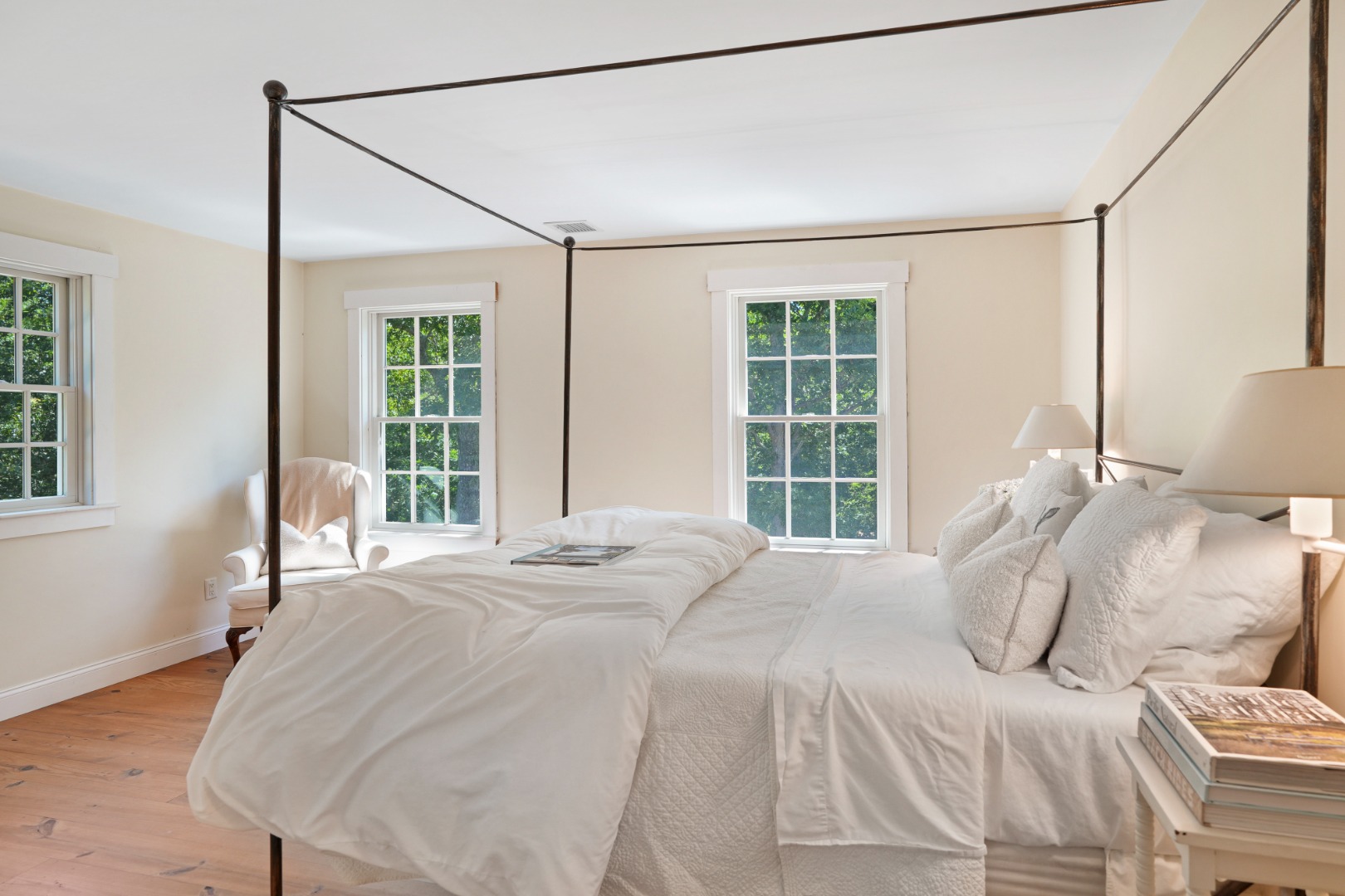 53 Stoney Hill Road West Tisbury, MA 02568 - Photo 36 of 51 a bedroom with a large bed and a large window